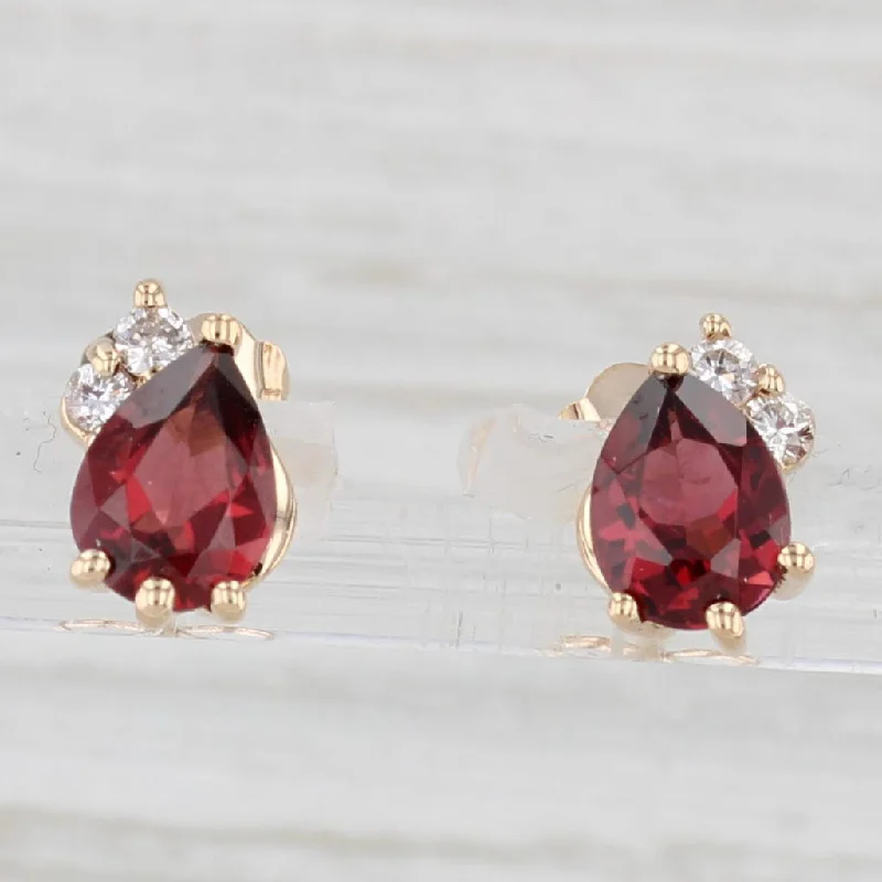 women's earrings for sensitive ears -1.84ctw Pear Garnet Diamond Stud Earrings 14k Yellow Gold