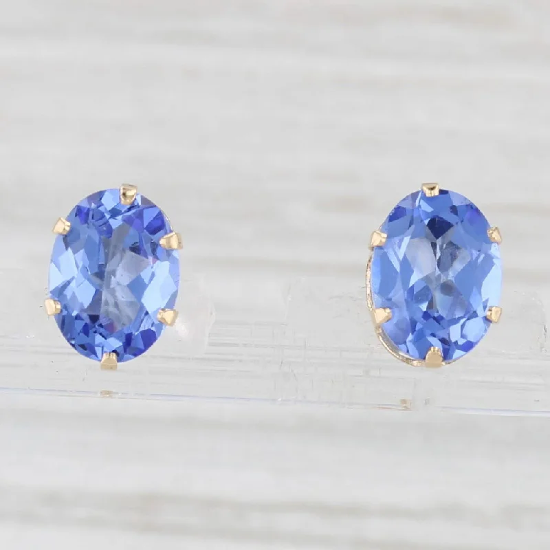 women's earrings sapphire gemstone -Blue Glass Solitaire Stud Earrings 14k Yellow Gold Oval Solitaire Studs