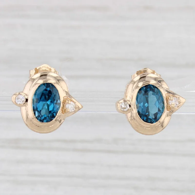 women's earrings simple design -2.17ctw Blue Topaz Diamond Stud Earrings 14k Yellow Gold