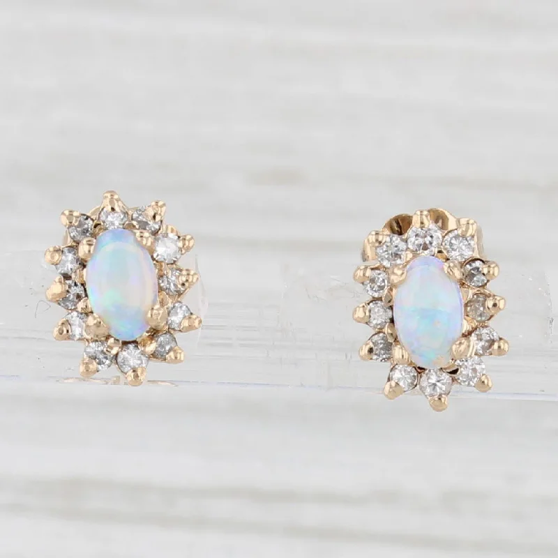 women's earrings round cut -Opal Diamond Halo Stud Earrings 14k Yellow Gold Vintage Oval Cabochon Studs