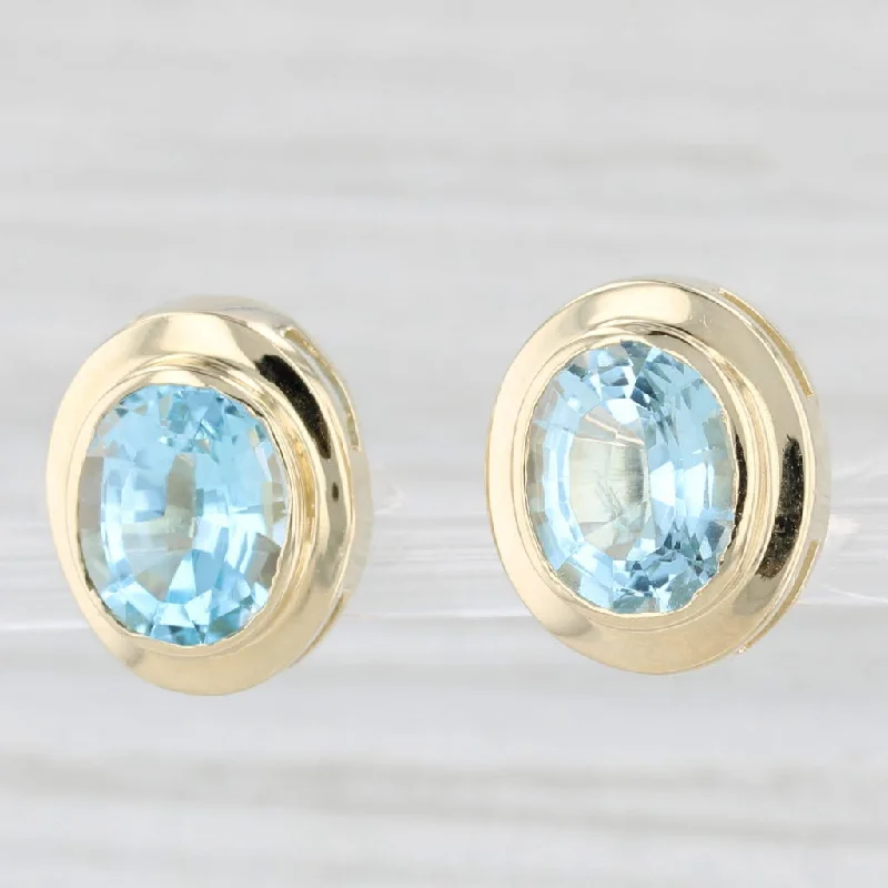 women's earrings butterfly shape -7.30ctw Oval Blue Topaz Stud Earrings 14k Yellow Gold